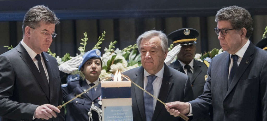 UN officials and family members gather in a solemn ceremony to honour 168 staff members who died in service during 2024, including 126 in Gaza.