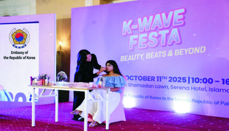 A vibrant cultural event at Serena Hotel Islamabad showcasing Korean beauty, music, and dance — guests enjoying K-Beauty sessions, K-Dance workshops, Hanbok dress-up, and Korean food stalls.