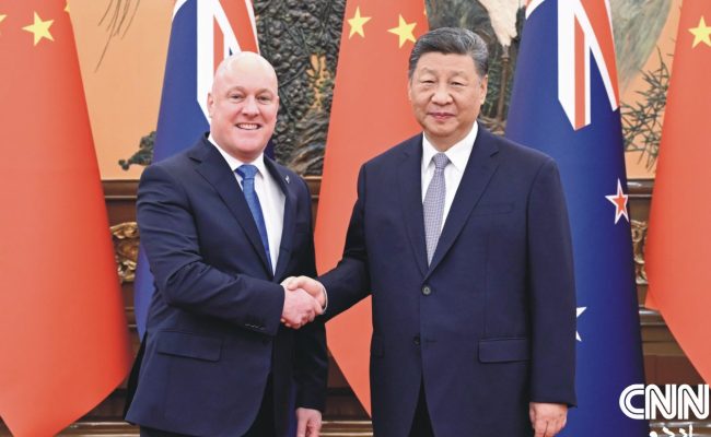 President Xi Jinping shaking hands with New Zealand Prime Minister Christopher Luxon during an official meeting in Beijing, China