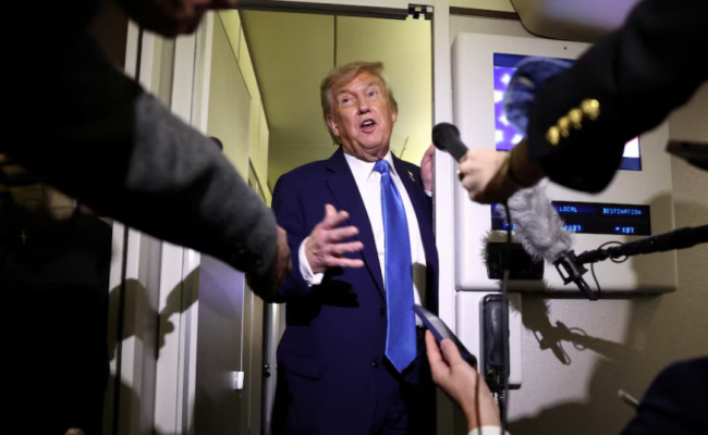 Former U.S. President Donald Trump speaking to reporters aboard Air Force One regarding the Iran-Israel conflict.