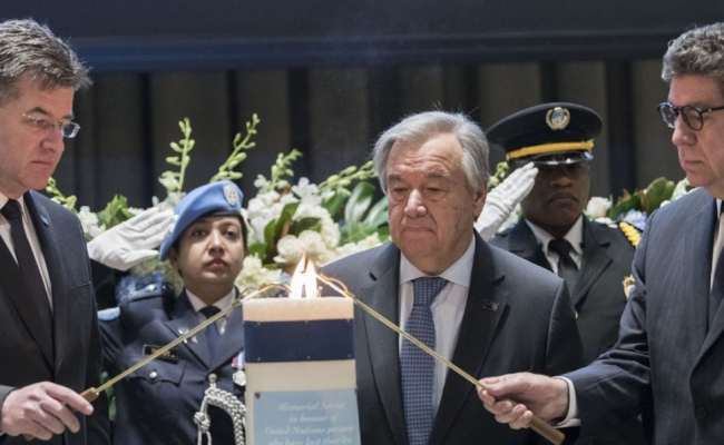 UN officials and family members gather in a solemn ceremony to honour 168 staff members who died in service during 2024, including 126 in Gaza.